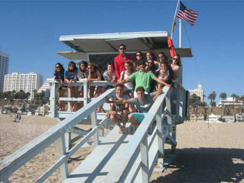 Students on iconic Lifeguard Tower