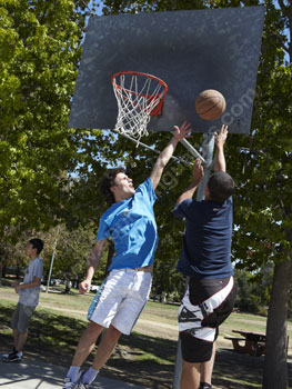 Playing basketball in the park