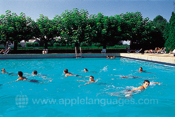 Students enjoying open air pool